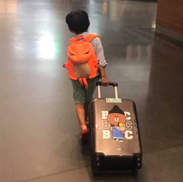 child traveling alone