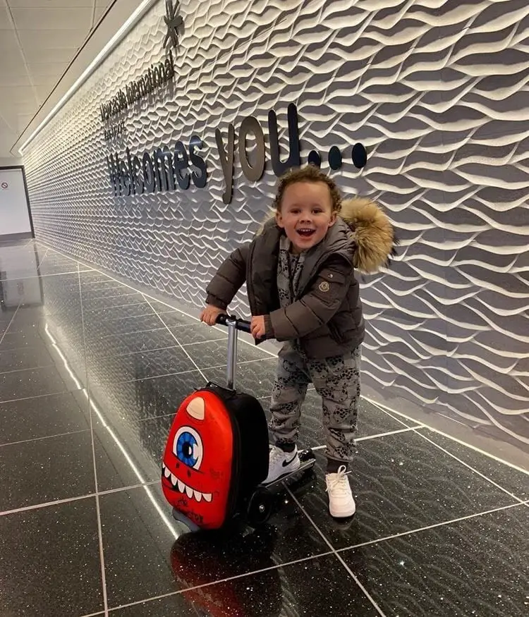 happy kid at the aiport