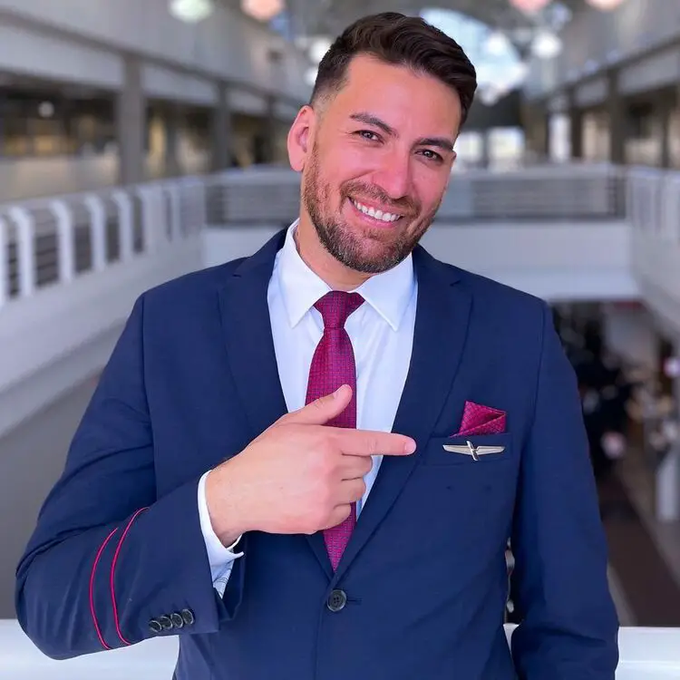 american airlines man flight attendant in uniform