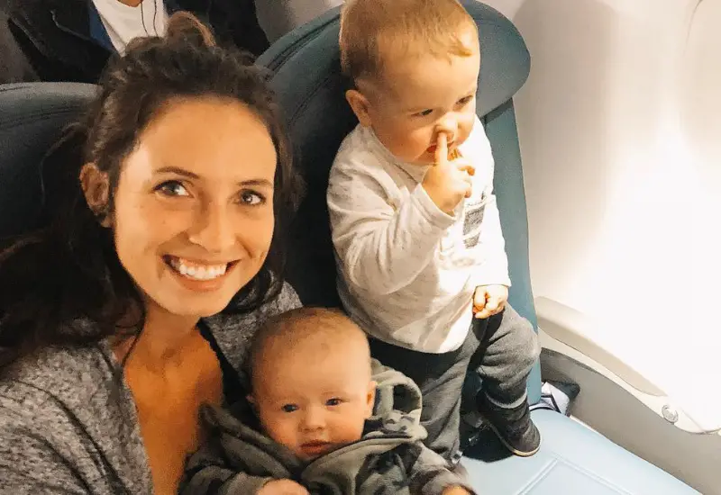 mother flying with babies