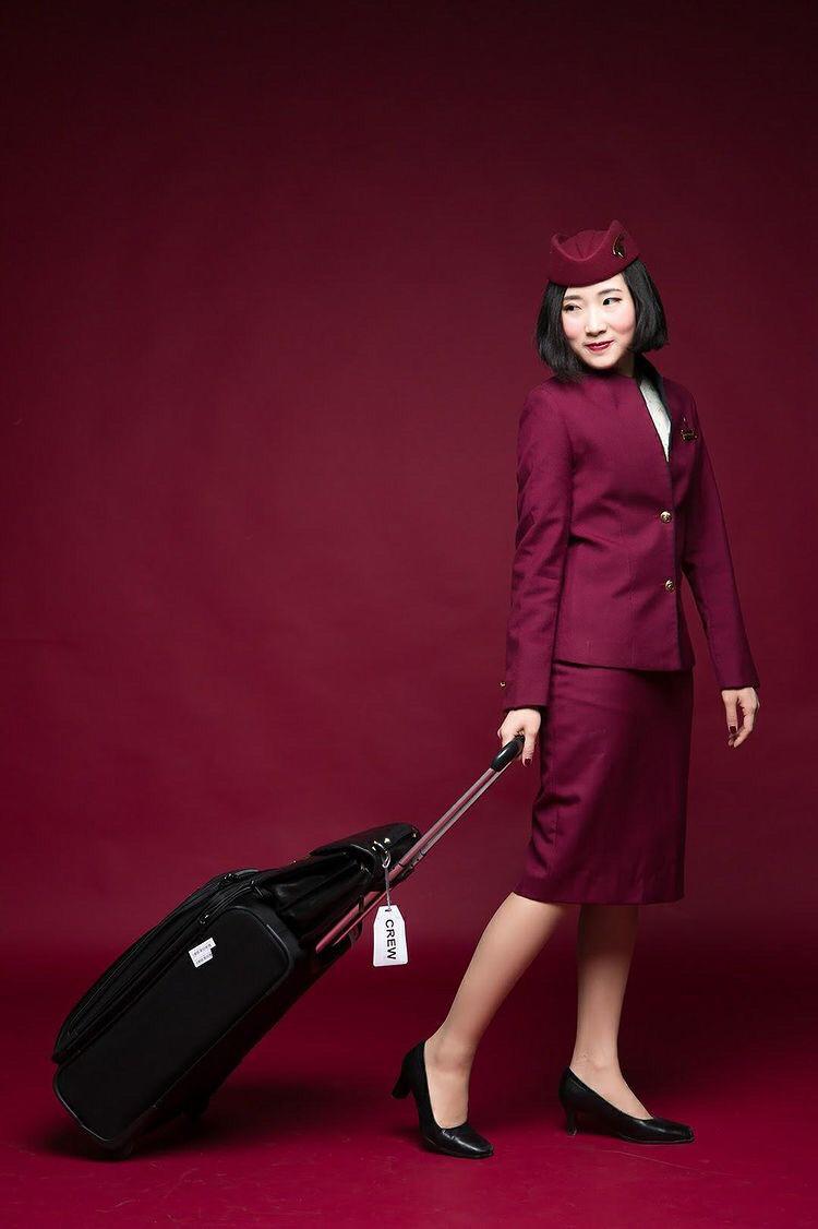 qatar uniform and luggage