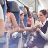 cabin crew attending a little girl